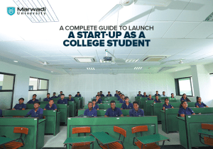 college student sitting around the table discussing ideas