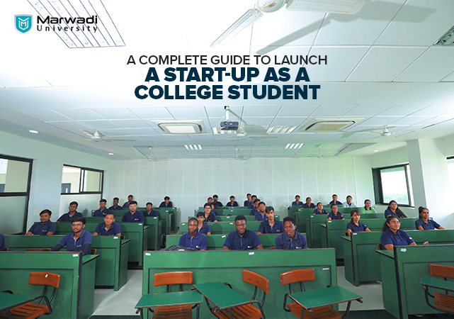 college student sitting around the table discussing ideas